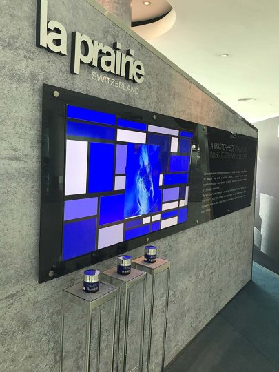 STAND LA PRAIRIE pre embarque aeropuerto de Ezeiza